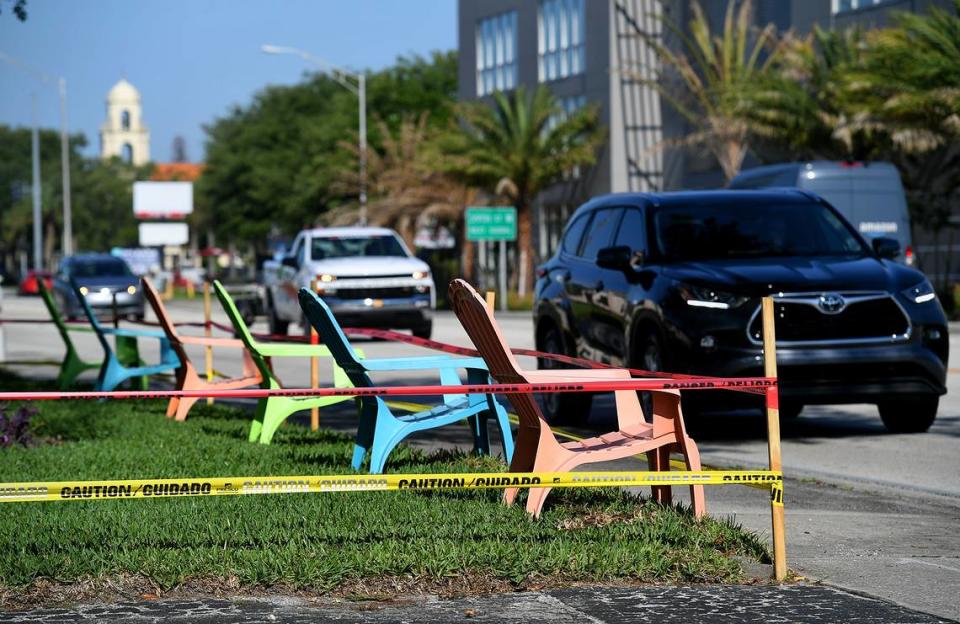 04/22/21--Colorful Adirondack-style chairs are set up along Manatee Avenue ahead of the De Soto Grand Parade.