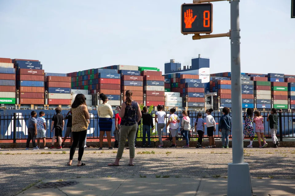 People look at CMA CGM Marco Polo container ship as it travels in the New York Harbor on May 20, 2021. (Photo by Michael Nagle/Xinhua via Getty Images)