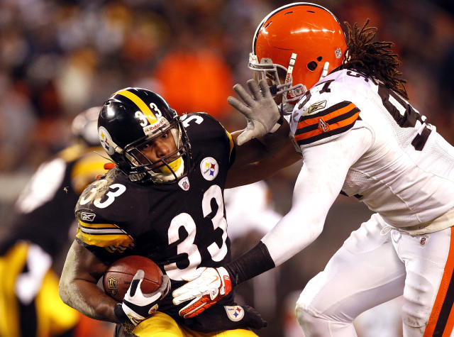 Pittsburgh Steelers running back Isaac Redman (33) is hit by