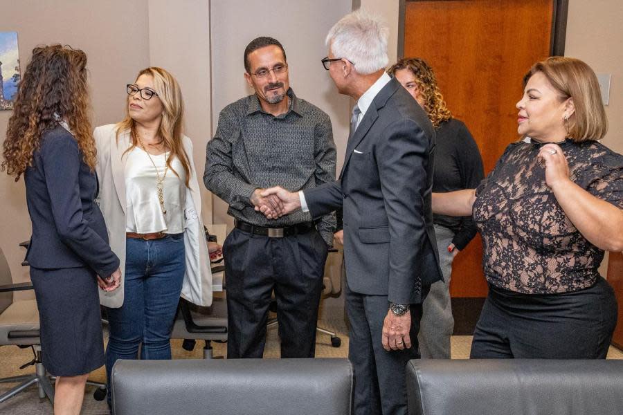 Gerardo Cabanillas shakes hands with Los Angeles County District Attorney George Gascón following a press conference in which the DA announced his release from prison and vacation of his conviction from 1996.
