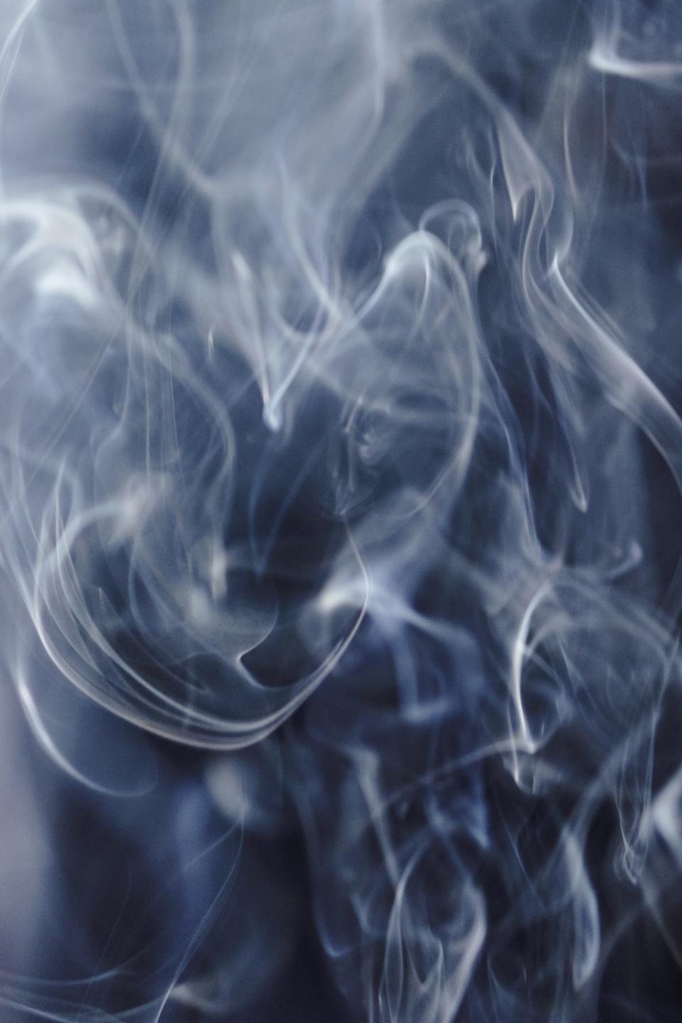 Steam rising against a black background