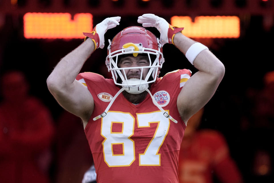 Kansas City Chiefs tight end Travis Kelce runs onto the field before an NFL football game against the Buffalo Bills Sunday, Dec. 10, 2023, in Kansas City, Mo. (AP Photo/Charlie Riedel)