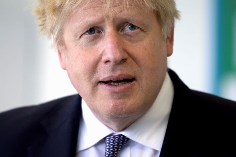 Britain's PM Johnson and finance minister Sunak visit school in London