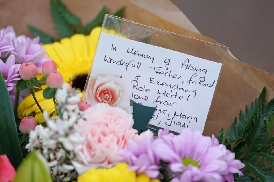 Flowers and messages are left in Tullamore, Co Offaly (Brian Lawless/PA) (PA Wire)
