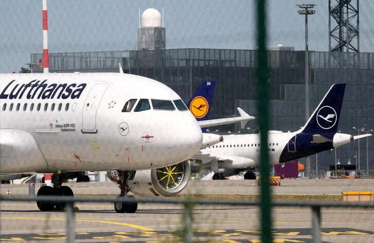 FILE PHOTO: Planes of German air carrier Lufthansa are parked at Frankfurt airport