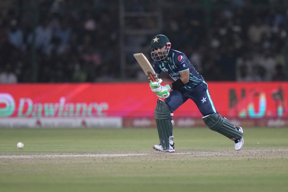 Pakistan's Mohammad Rizwan plays a shot during the fourth twenty20 cricket match between Pakistan and England, in Karachi, Pakistan, Sunday, Sept. 25, 2022. (AP Photo/Anjum Naveed)