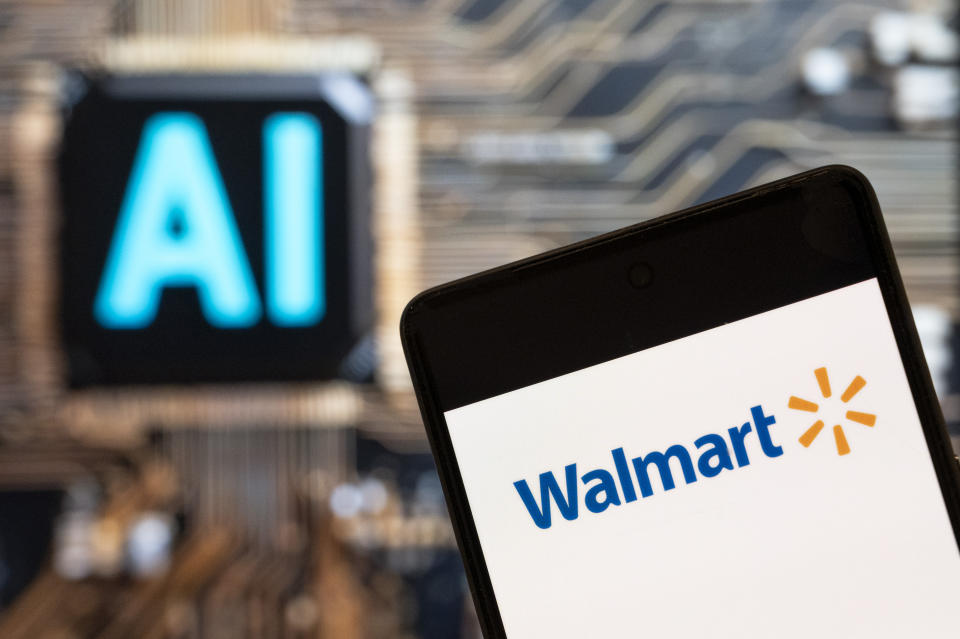 CHINA - 2023/11/03: In this photo illustration, the American multinational department stores Walmart (NYSE: WMT) logo seen displayed on a smartphone with an Artificial intelligence (AI) chip and symbol in the background. (Photo Illustration by Budrul Chukrut/SOPA Images/LightRocket via Getty Images)