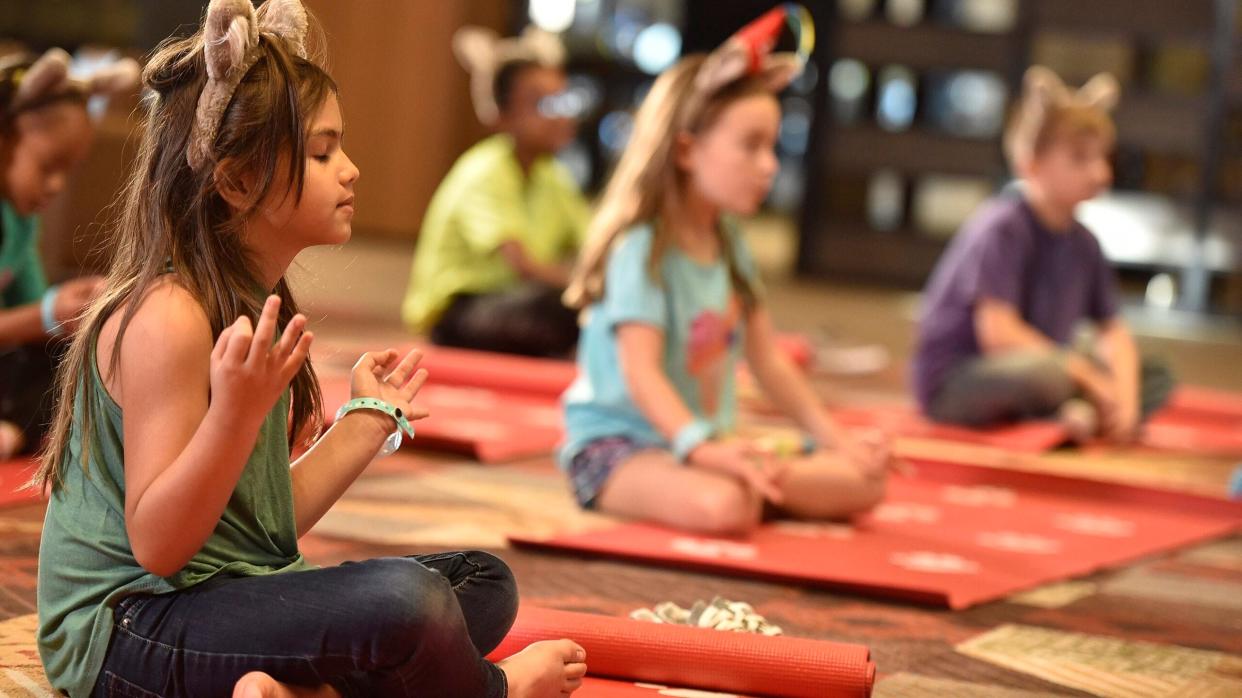 Opening in October 2024, Great Wolf Lodge South Florida will feature activities like the Yoga Tails morning exercise program.
