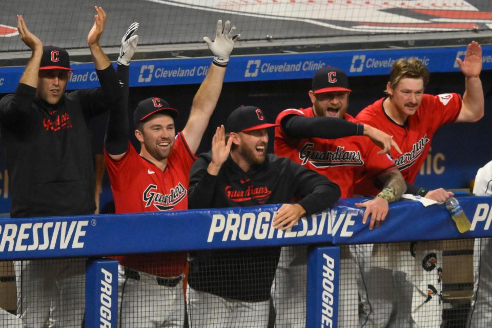 Sep 25, 2024; Cleveland, Ohio, USA; The Cleveland Guardians celebrate a three-run home run by third baseman Jose Ramirez (not pictured) in the eighth inning against the Cincinnati Reds at Progressive Field. Mandatory Credit: David Richard-Imagn Images