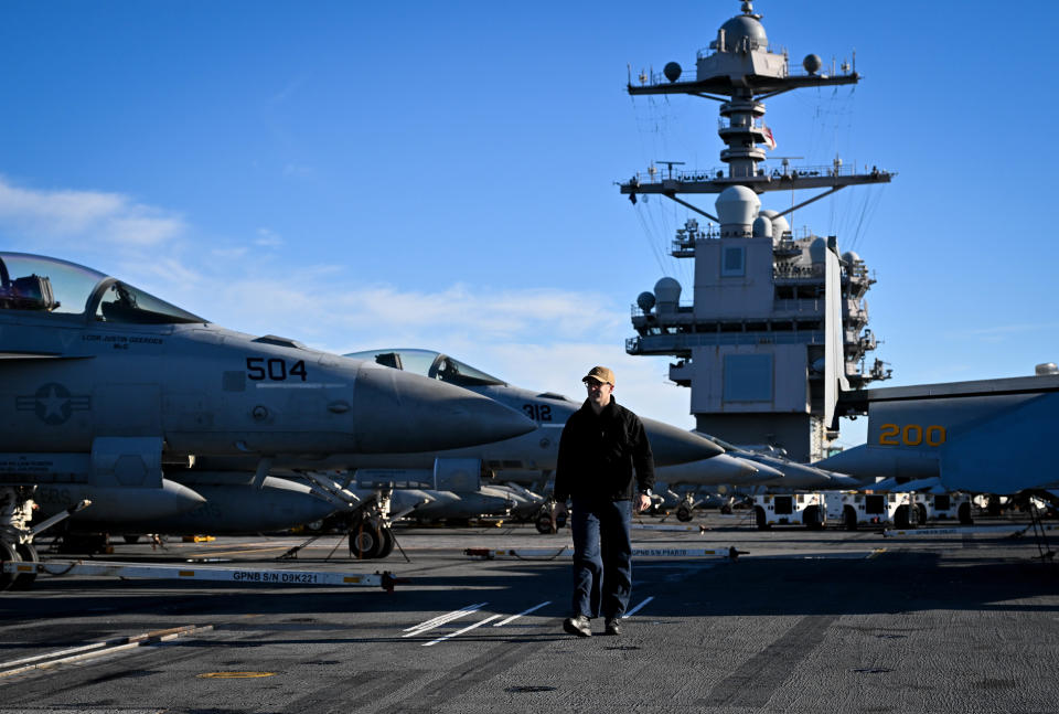 GOSPORT, ENGLAND - NOVEMBER 17: Ensign Marty Carey walks on the flight deck of USS Gerald R. Ford, on November 17, 2022 in Gosport, England. The USS Gerald R. Ford (CVN-78) is the lead ship of her class of United States Navy aircraft carriers. Commissioned in 2017, the carrier is powered by two nuclear reactors with a length of 1,092 feet and displacement of 100,000 long tons full load. With a crew of approximately 4,550, 75+ aircraft and state of the art weaponry, the first-in-class is the US Navy's most advanced aircraft carrier. USS Gerald Ford has been carrying out NATO exercises in the North Atlantic with French and Spanish ships. (Photo by Finnbarr Webster/Getty Images)