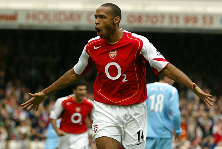 Henry in action for Arsenal in 2004 - he now has a statue in his honour outside the Emirates Stadium