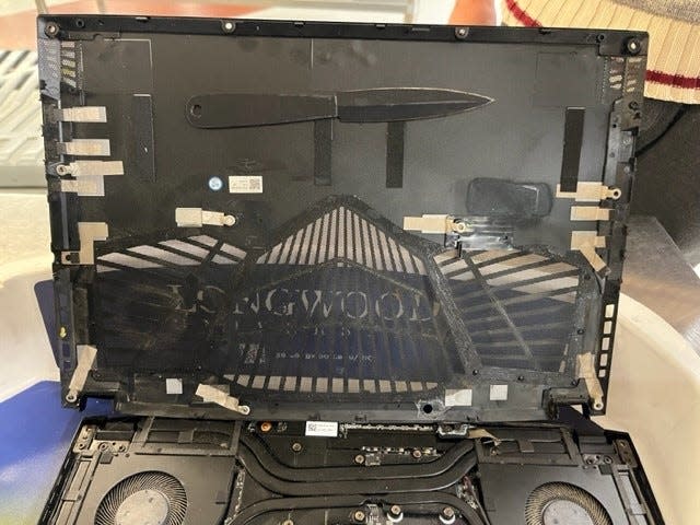 A man from Williamsburg, Va., was stopped by Transportation Security Administration officers at a Richmond International Airport security checkpoint after they detected a double-bladed knife that was concealed inside the inner workings of his laptop. on Nov. 11, 2022.