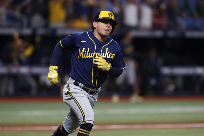 Milwaukee Brewers' Luis Urias runs down the first base line after hitting a home run against the Tampa Bay Rays during the sixth inning of a baseball game Tuesday, June 28, 2022, in St. Petersburg, Fla. (AP Photo/Scott Audette)