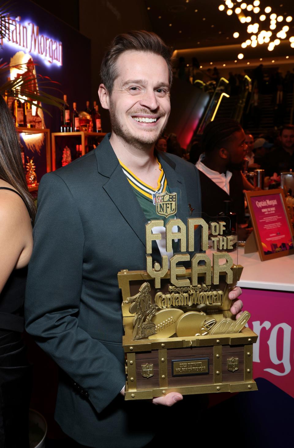 Tom Grossi, winner of the fan of the year award, poses during the NFL Honors award show.