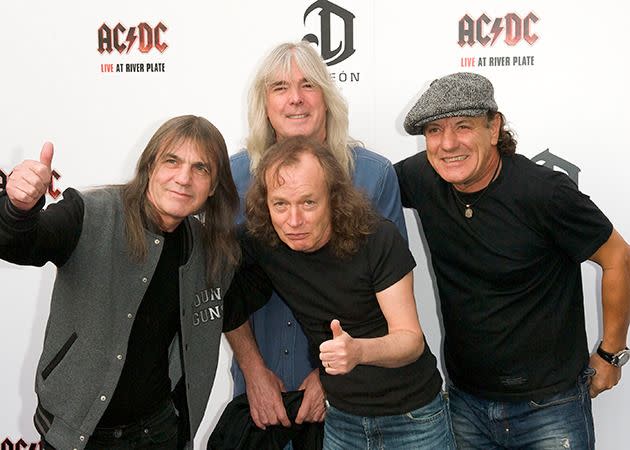 Malcolm Young with the other members of AC/DC.