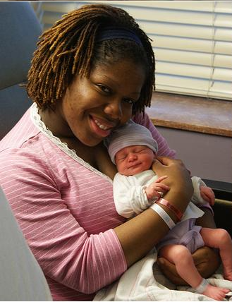 Carmen Black holds her newborn daughter in Augusta, Ga., in March 2009.