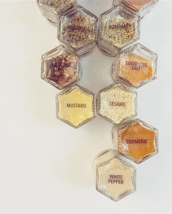 the same reviewer shows a close-up of the jars with labels on them