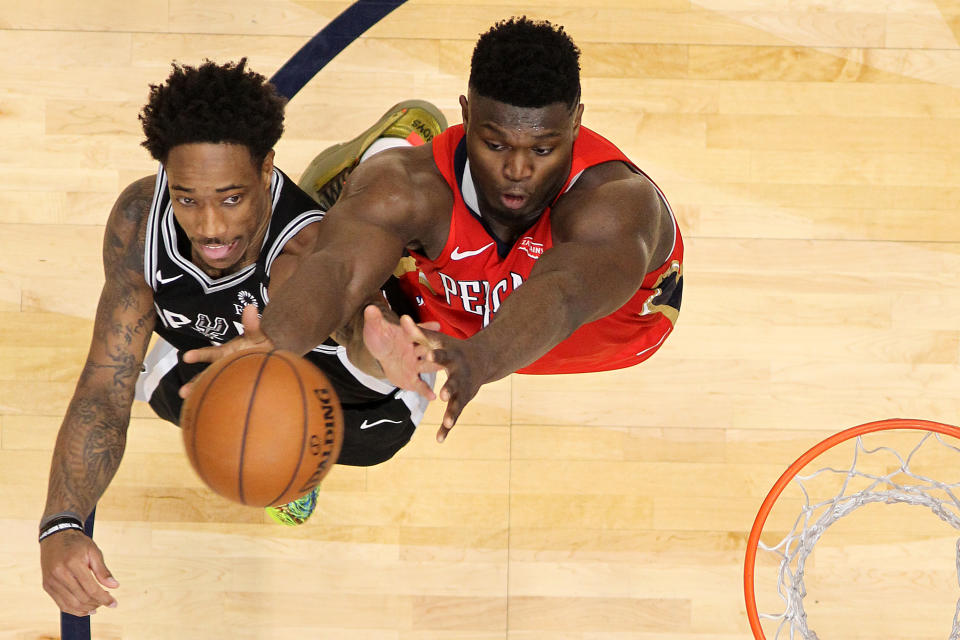 Neither DeMar DeRozan's Spurs nor Zion Williamson's Pelicans can afford a loss on Sunday. They play each other. (Chris Graythen/Getty Images)