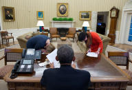 <p>“This is one of those photographs that needs some explanation. On February 7, 2014, the President had been meeting with Communications Director Jennifer Palmieri, left, and Senior Communications Advisor Tara McGuinness, to prep for a radio interview. At one point, the President made a comment so humorous that Jenn and Tara bent over in laughter.” (Pete Souza/The White House) </p>