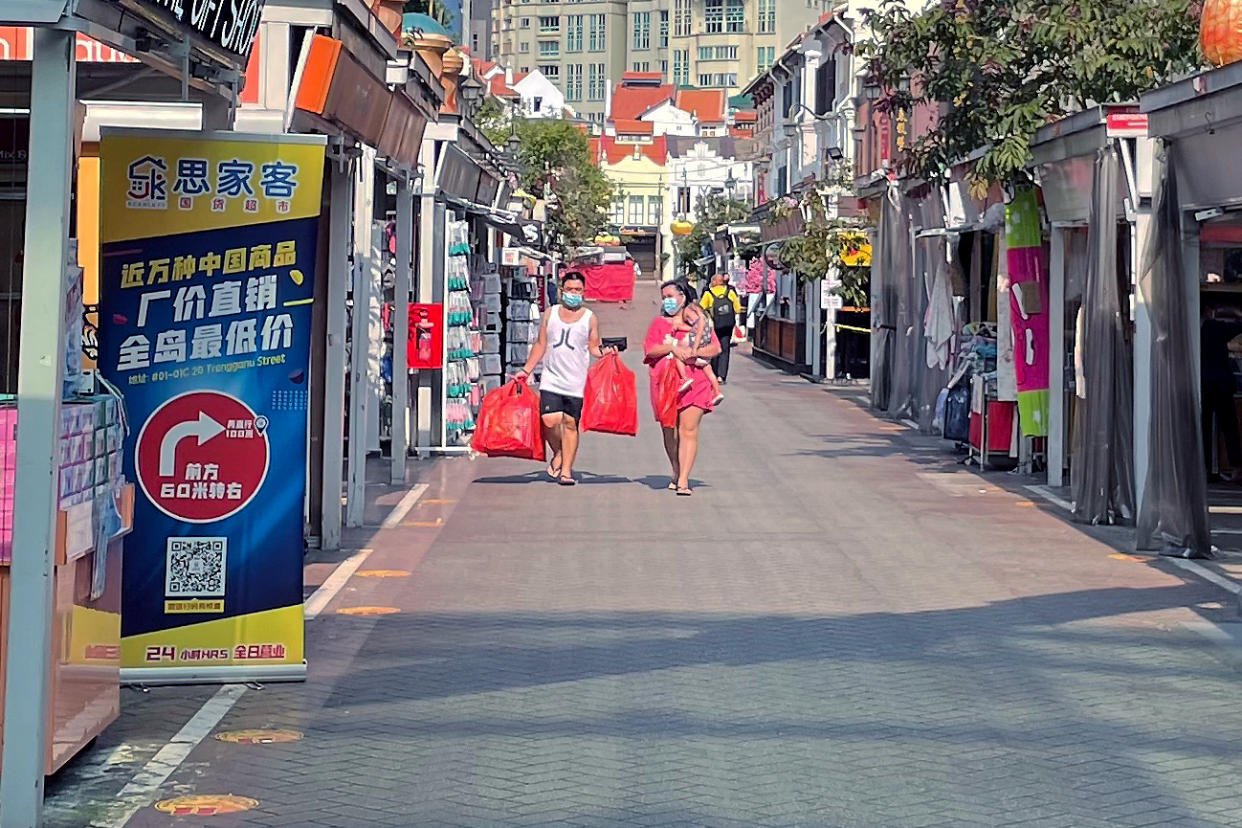 People seen in the Chinatown area on 24 May 2021, amid Singapore's Phase 2 (Heightened Measures) period. (PHOTO: Dhany Osman / Yahoo News Singapore)