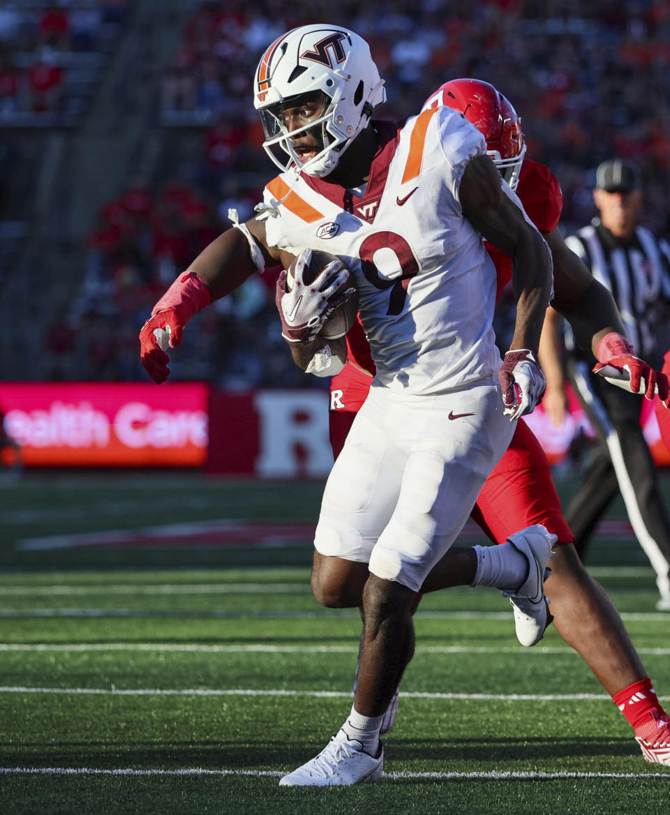 Virginia Tech wide receiver Da'Quan Felton (9) runs with the ball after he made a catch during the second half of an NCAA college football game against Rutgers, Saturday, Sept. 16, 2023, in Piscataway, N.J. (Andrew Mills/NJ Advance Media via AP)