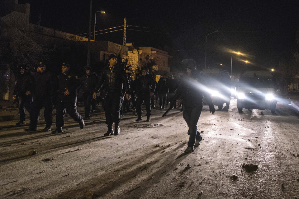 <p>Riot police patrol in the streets of Tebourba, south of the Tunisian capital, Tunis, after clashes with demonstrators, Jan. 9, 2018. (Photo: Amine Landoulsi/AP) </p>