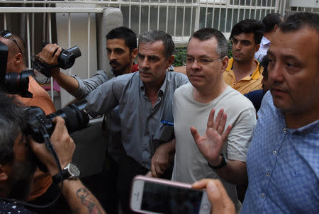 U.S. pastor Andrew Brunson reacts as he arrives at his home after being released from the prison in Izmir, Turkey July 25, 2018. Picture taken July 25, 2018. Demiroren News Agency, DHA via REUTERS