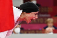 <p>Egypt's Feryal Abdelaziz reacts as she wins the gold medal in Women's Kumite Final of the Karate Competition. </p>