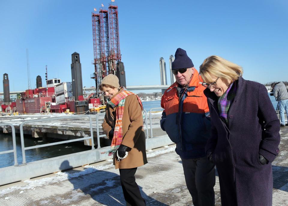 NH Port Authority Director Geno Marconi escorts NH Senators Jeanne Shahee, left, and Maggie Hassan after a quick tour relating to the Portsmouth Harbor and Piscataqua River projects Jan. 31, 2022.