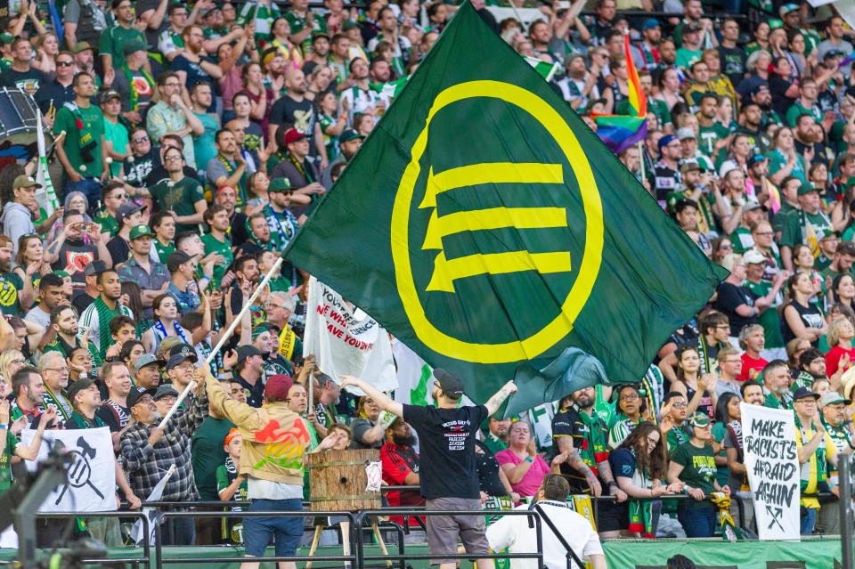 Several Timbers fans have been suspended by MLS for flying the anti-fascist Iron Front flag. (Photo by Diego Diaz/Icon Sportswire via Getty Images).