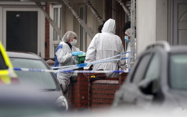 Forensic officers at the scene of the incident