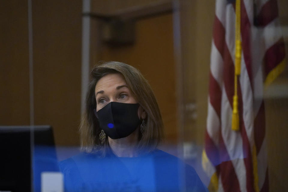 Judge Anne-Christine Massullo listens during a hearing for Scott Peterson at the San Mateo County Superior Court in Redwood City, Calif., Monday, Feb. 28, 2022. In 2004, Peterson was convicted of the murders of his wife, Laci Peterson, 27, who was eight months pregnant, and of the unborn son they planned to name Conner. (AP Photo/Jeff Chiu, Pool)