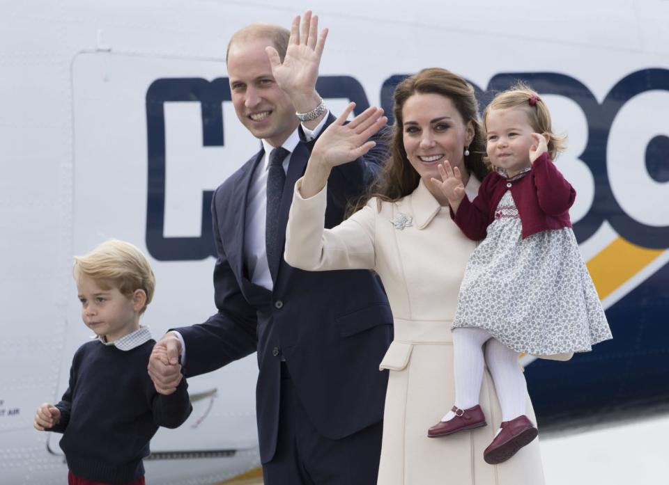 <p>Charlotte already knows how to work a crowd, waving goodbye to Canada.<br><i>[Photo: PA]</i> </p>