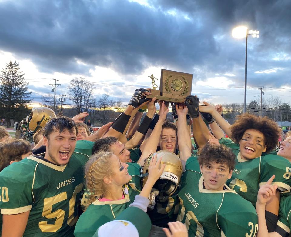 Windsor celebrates after defeating BFA-Fairfax/Lamoille 35-21 on Saturday at Rutland for its second straight perfect season in Division III high school football.