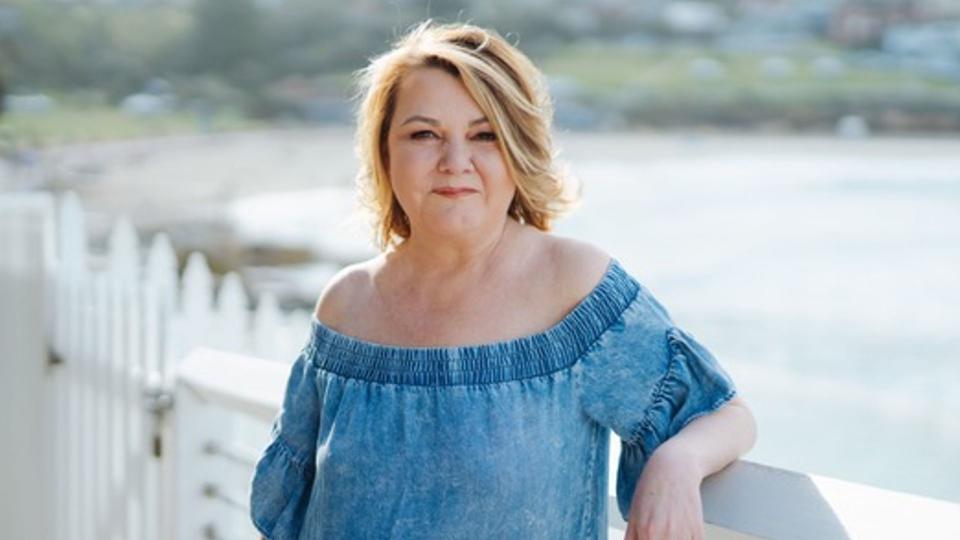 Lady in off the shoulder denim top