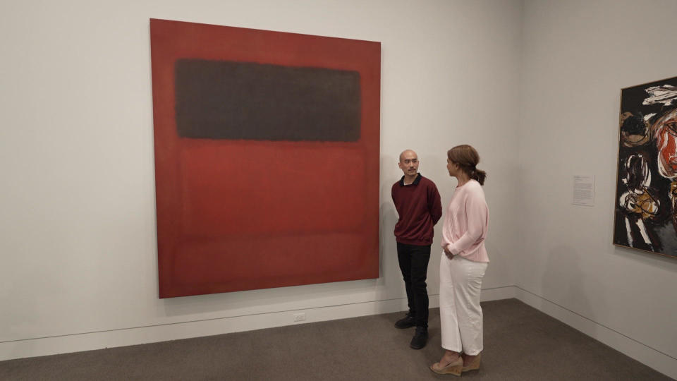 Security guard Chris Koo discusses Mark Rothko's 