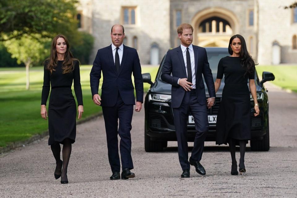 The Princess of Wales, the Prince of Wales and the Duke and Duchess of Sussex walk to meet members of the public at Windsor Castle in Berkshire following the death of Queen Elizabeth II (PA)