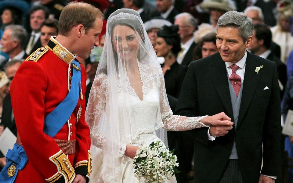 Prince William and Kate Middleton with her father Michael Middleton at Westminster Abbey - Credit: PA