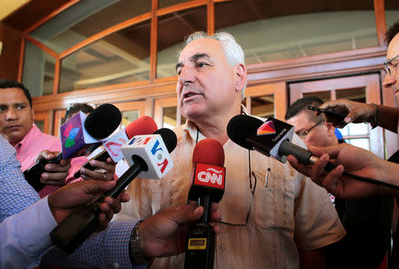 Special envoy of the OAS General Secretariat Luis Angel Rosadilla speaks with journalists after a meeting with Cristobal Fernandez, chief of the Department of Cooperation and Electoral Observation of OAS in Managua, Nicaragua April 24, 2019.REUTERS/Oswaldo Rivas