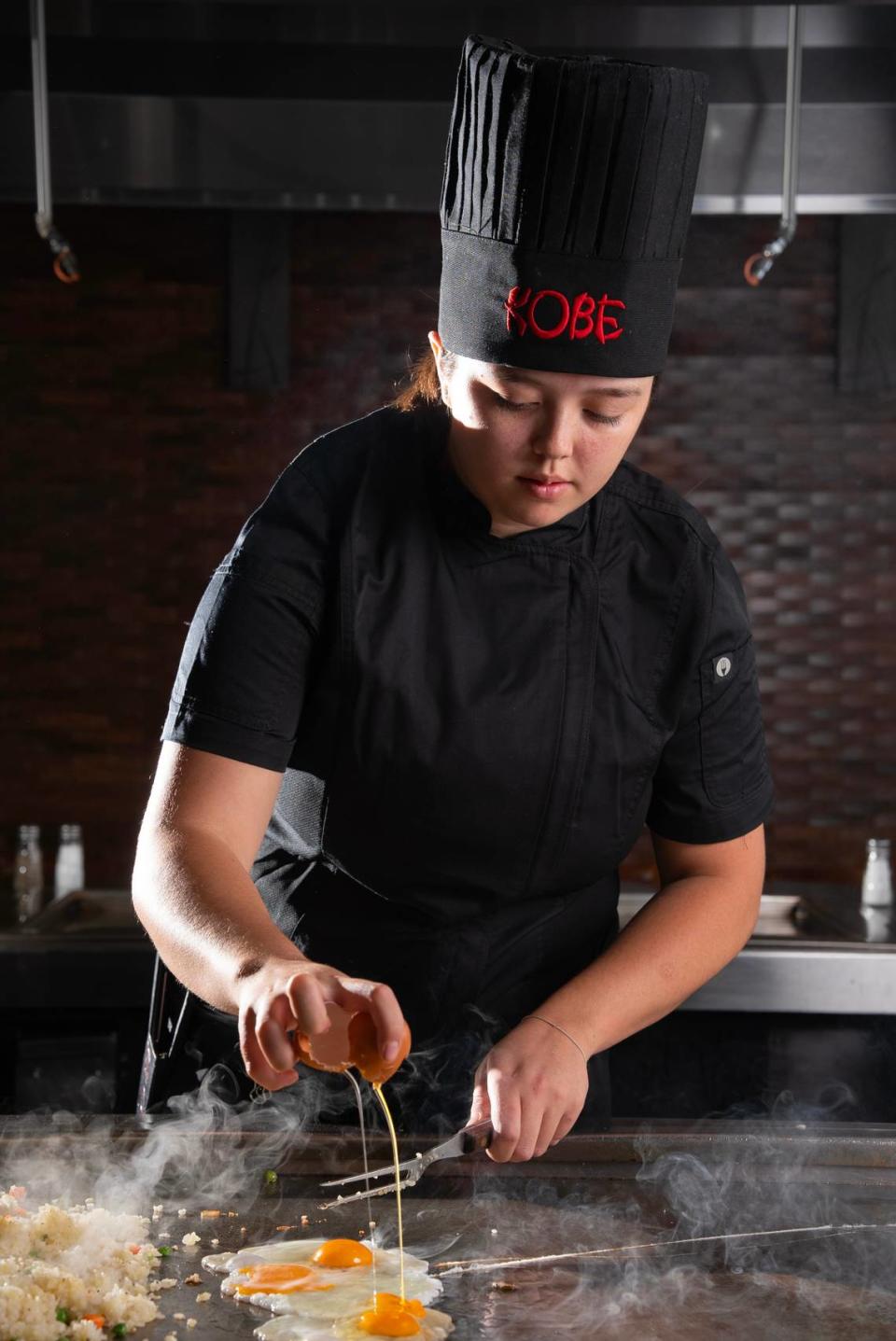 Kobe Japanese Steakhouse chef Evelynn Harader was recently promoted from kitchen assistant to performing hibachi chef.