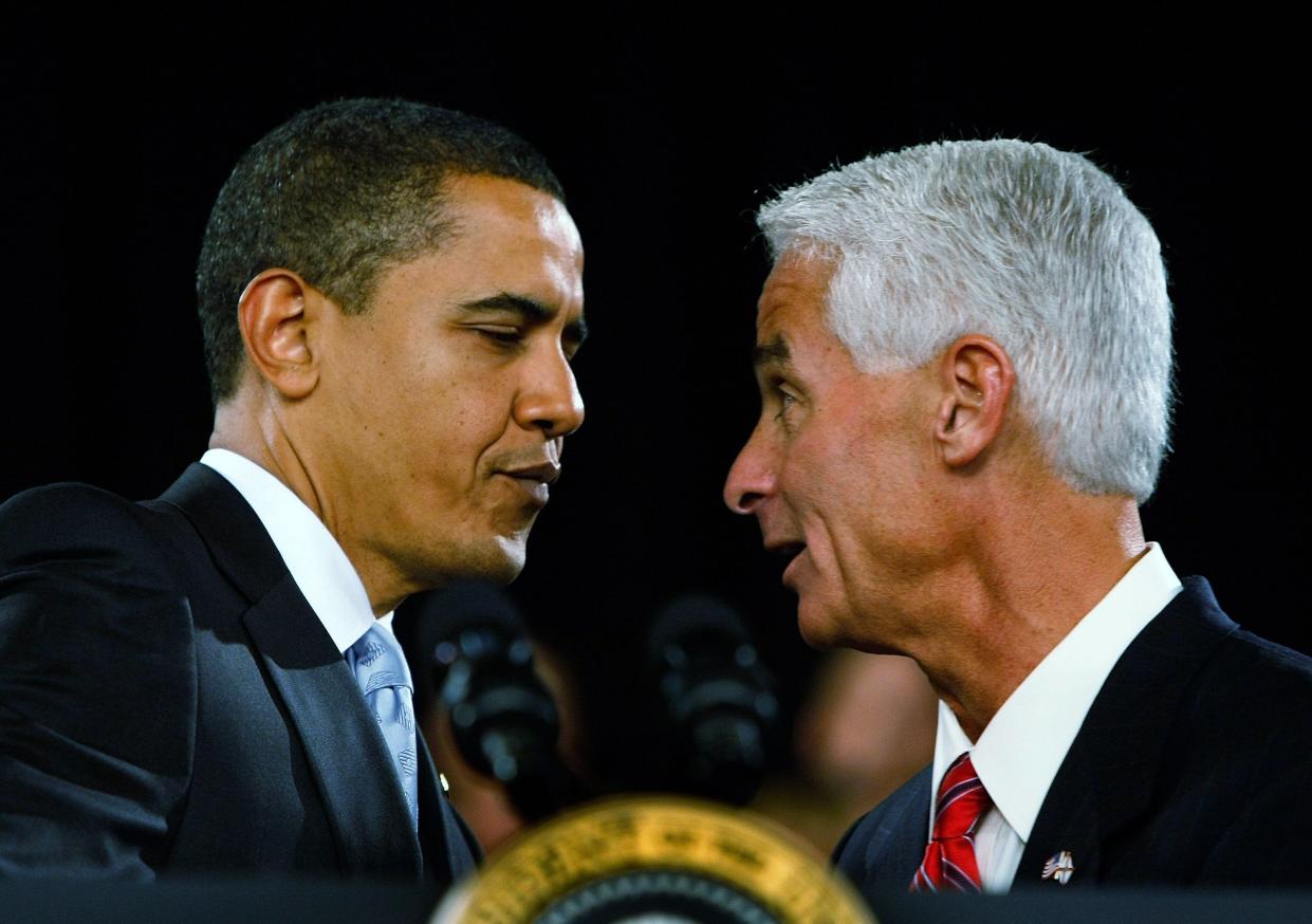 Then-Republican Gov. Charlie Crist introduces then-President Barack Obama during a town hall meeting on Feb. 10, 2009, in Fort Myers, Florida.  (Photo: Joe Raedle via Getty Images)