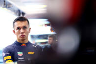 SINGAPORE - SEPTEMBER 21: Alexander Albon of Thailand and Red Bull Racing prepares to drive in the garage during final practice for the F1 Grand Prix of Singapore at Marina Bay Street Circuit on September 21, 2019 in Singapore. (Photo by Mark Thompson/Getty Images)