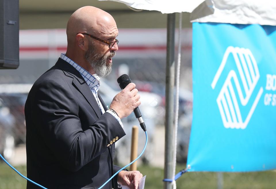 Tyler Farner, Boys and Girls Clubs of Story County board president, speaks during the groundbreaking ceremony at South 5th Street on Friday, April 5, 2024, in Ames, Iowa.