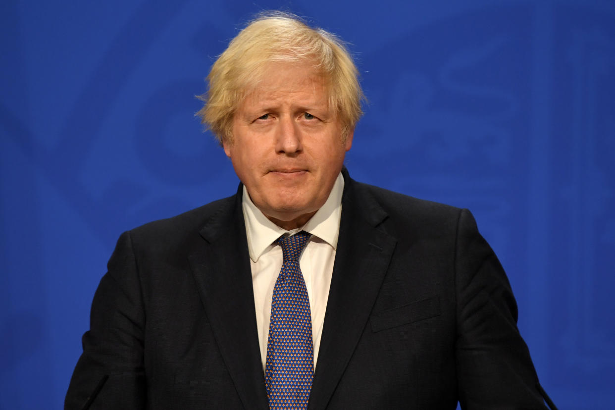 LONDON, ENGLAND - JULY 12: British Prime Minister Boris Johnson gives an update on relaxing restrictions imposed on the country during the coronavirus covid-19 pandemic at a virtual press conference inside the Downing Street Briefing Room on July 12, 2021 in London, England.  The government plans to end most Covid-19 social restrictions, such as the legal mandate to wear masks and distancing rules, in England on July 19. (Photo by Daniel Leal-Olivas-WPA Pool/Getty Images)