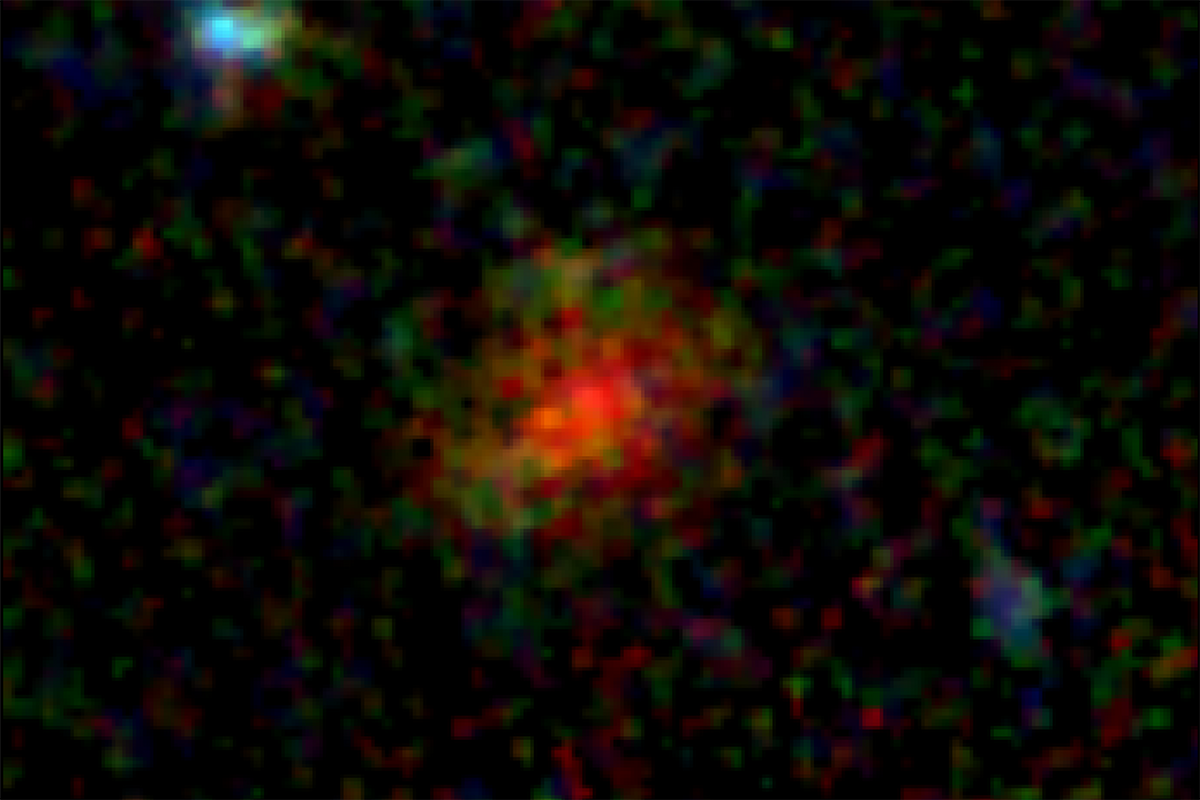 The image may appear blurry, but astronomers had to turn to the powerful infrared capabilities of NASA's James Webb Space Telescope to penetrate the dust shrouding the ancient galaxy named AzTECC71 to capture this photo.