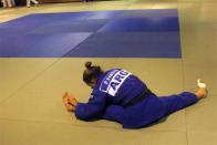 Argentine judoka Paula Pareto stretches during a training session at Cenard Sports Complex in Buenos Aires, March 26, 2012.