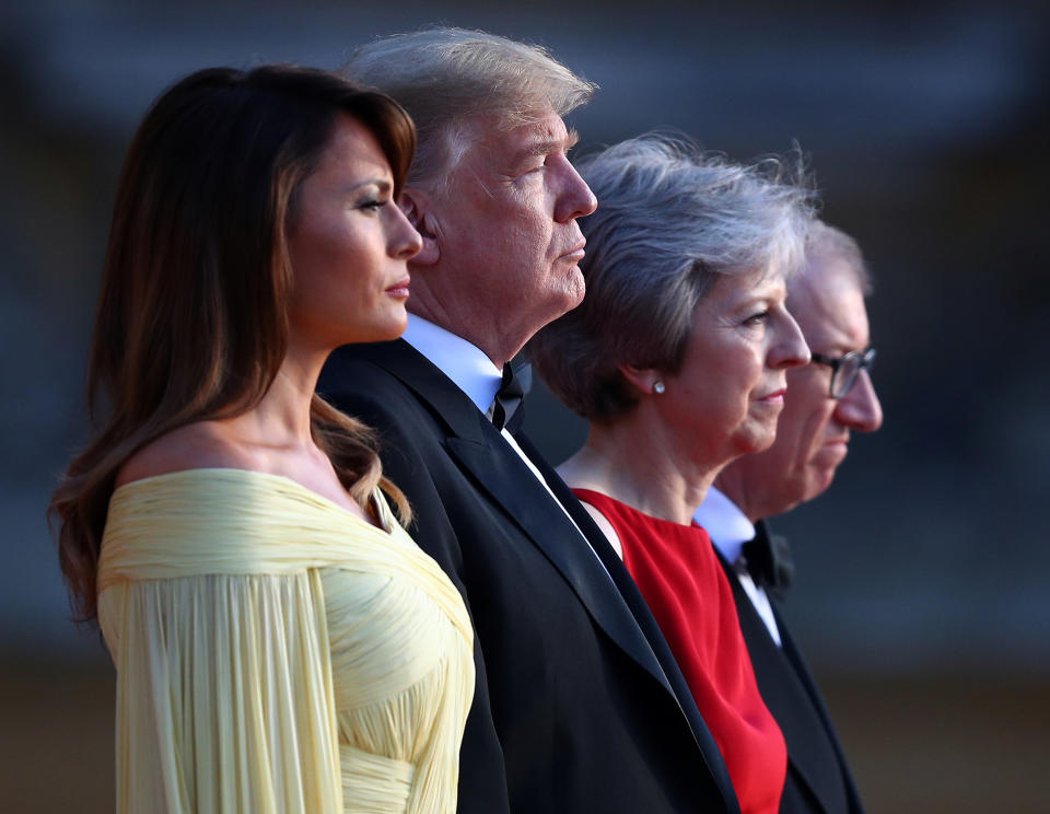 <p>British Prime Minster Theresa May and her husband Philip stand together with President Donald Trump and first lady Melania Trump at the entrance to Blenheim Palace, where they are attending a dinner with specially invited guests and business leaders, near Oxford, Britain, July 12, 2018. (Photo: Hannah McKay/Reuters) </p>