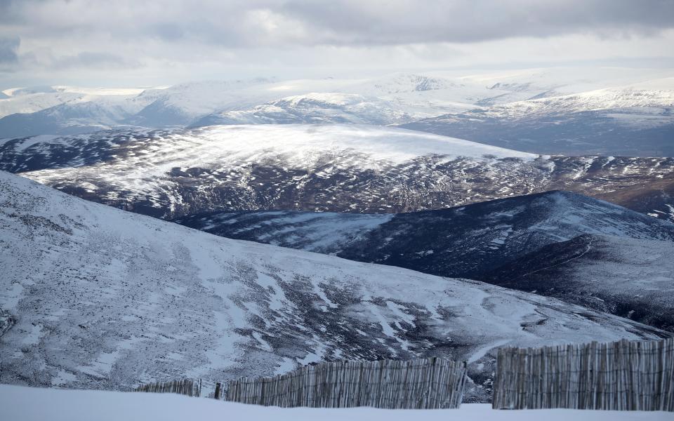 The snow-covered Cairngorm mountain range, Aviemore - Credit: Jane Barlow/PA