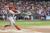 St. Louis Cardinals' Andrew Knizner hits a two-run home run during the fourth inning of a baseball game against the Milwaukee Brewers Tuesday, Sept. 27, 2022, in Milwaukee. (AP Photo/Morry Gash)