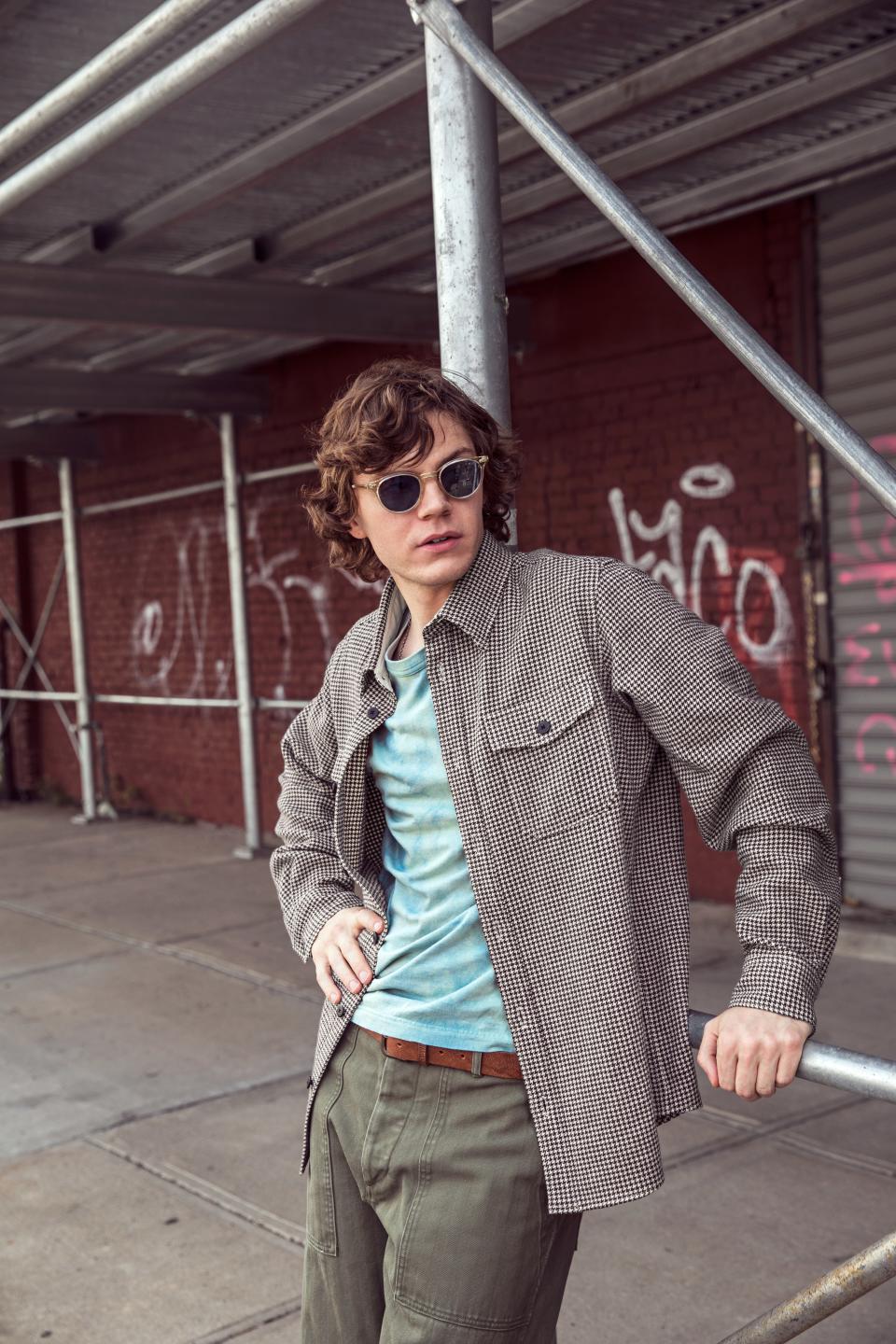 <cite class="credit">Shirt, $960, T-shirt, $575, and pants, $745, by Visvim / Belt, $165, by Camp Hero / Sunglasses, $666, by Mr. Leight</cite>